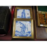 A Pair of Framed XIX Century Blue and White Tiles, of a man holding a bow and arrow and one of a
