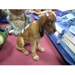 Royal Doulton China Bloodhood, seated on back legs, HN176, 14.5cm high.