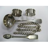 A Hallmarked Silver Fiddle Pattern Sauce Ladle, a pair of hallmarked silver napkin rings, chain,