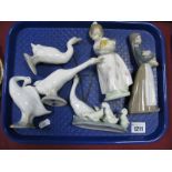 Lladro Pottery, two maidens, three geese and geese family group. (6)