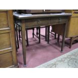 An Early XX Century Oak Side Table, with moulded border, twin drawers on tapering legs, 91cm wide,