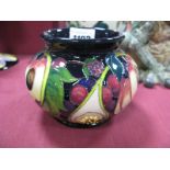 A Moorcroft Pottery Vase, painted with the Queens Choice pattern designed by Emma Bossons, shape