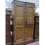 An Edwardian Two-Piece Oak Office Cabinet, with Greek key top, comprising two central drawers