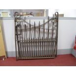 A Pair of Cast Iron Driveway Gates, with graduated needle uprights, each approximately 137cm wide.
