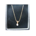 A Modern Single Stone Diamond Pendant, the brilliant cut stone claw set, sliding on a 9ct gold snake