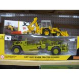 A Norscott 1:50th Scale Diecast Model #SS175 CAT 657G Wheel Tractor Scraper; together with a NZG