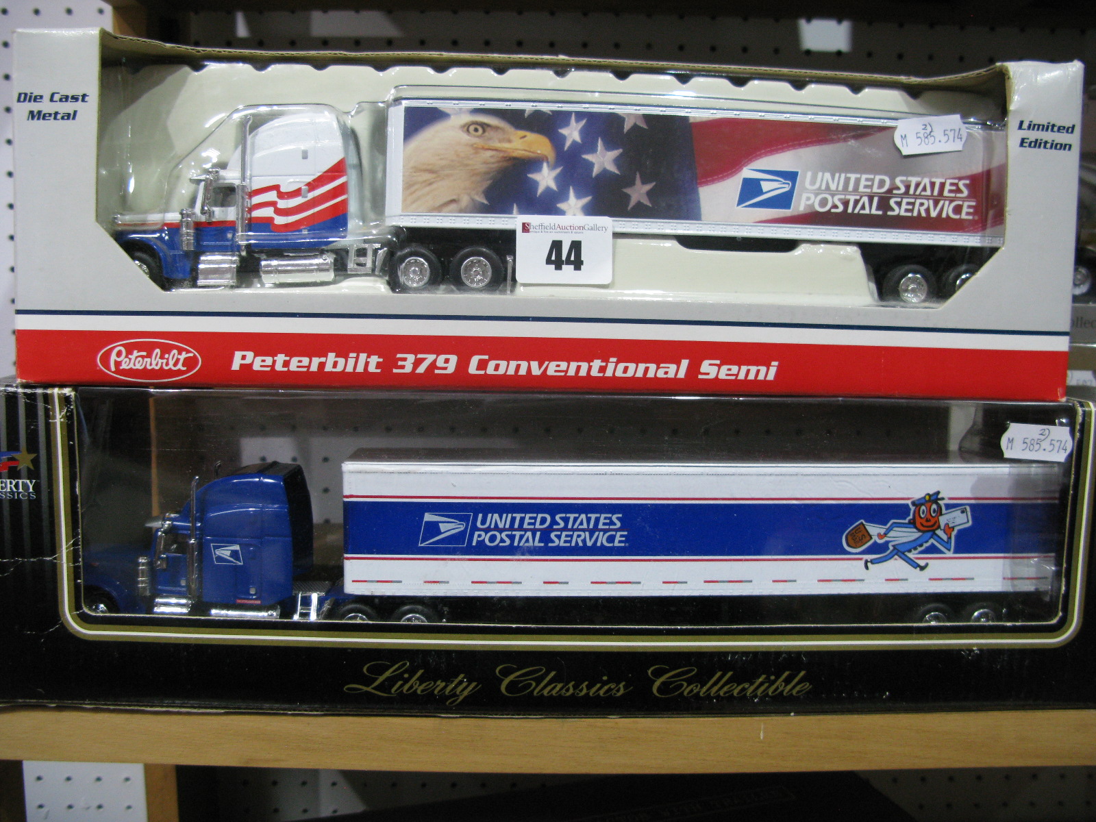 Two Liberty Classics Diecast Model Peterbilt Tractor Trailers, both with United States Postal