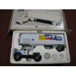 A First Gear 1:34th Scale Diecast Model 1960 Model B-61 Mack Tractor and Trailer 'United States
