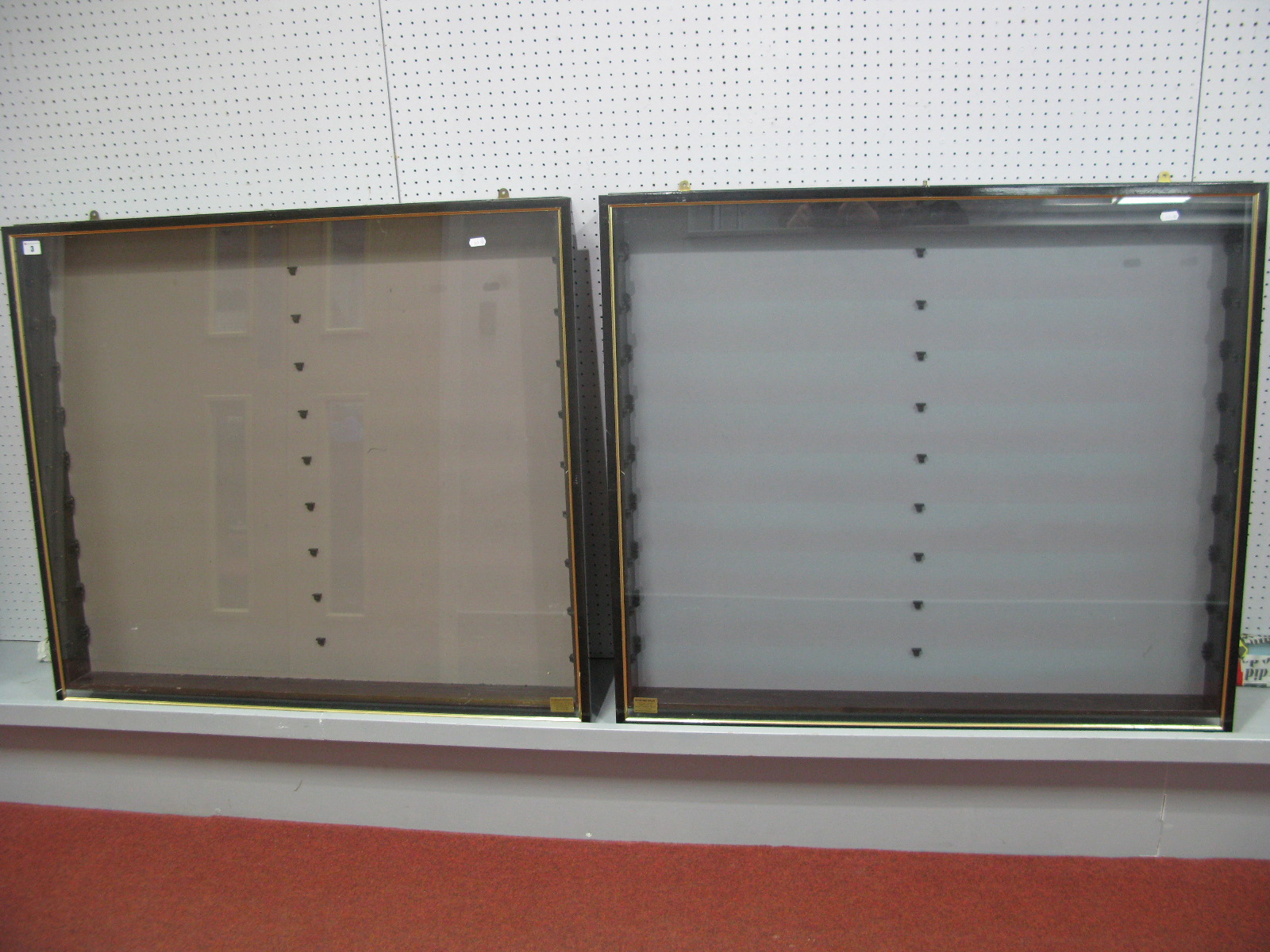 Two Wall Mounted Glass Display Cases, with glass shelves, 95cm x 85cm x 9cm. Note: glass fronts need