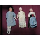 Two Bisque Headed Character Dolls, heads stamped Germany c. 23cm tall. Plus a composition headed