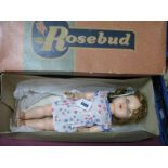 A Mid XX Century Jointed Rosebud Doll, with jointed knees, 40cm tall, in original box.