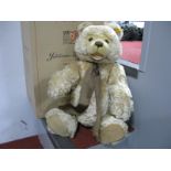 A Modern Jointed Centenary Blonde Bear by Steiff, with growler, button to ear, 44cm tall, boxed.