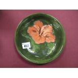 Moorcroft Pottery 'Hibiscus' Pattern Dish, on green ground, impressed Moorcroft Made in England,