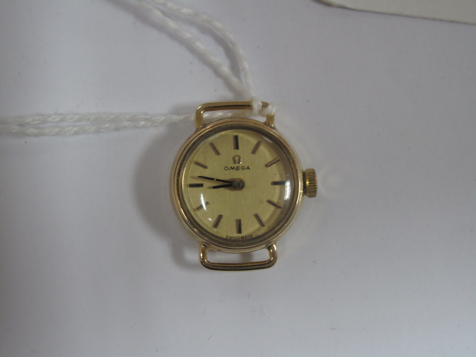 Omega; A 9ct Gold Cased Ladies Wristwatch Head, (no strap) the signed dial with line markers, the