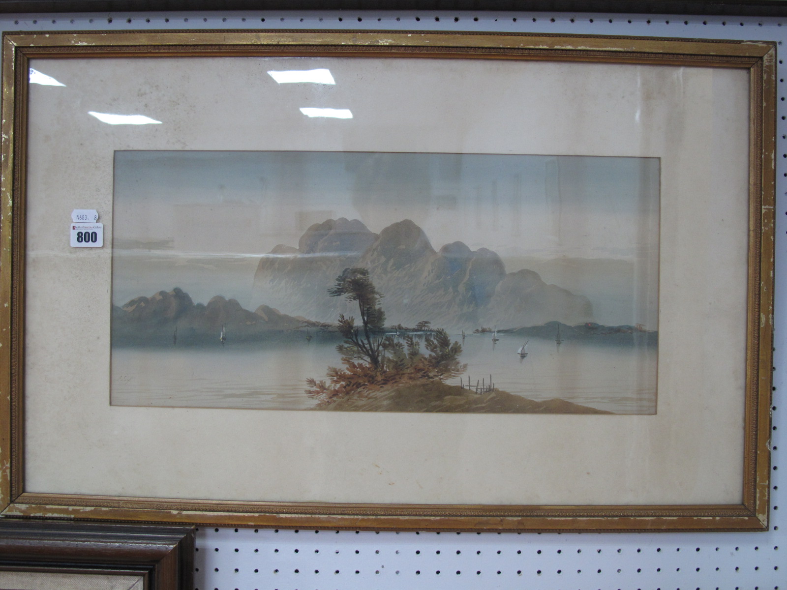 E. Earp, Shipping in Tranquil Waters, with distant mountains, watercolour, 23.5 x 50.5cm, signed