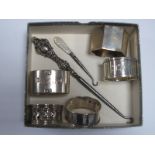 Five Assorted Hallmarked Silver Napkin Rings, (various makers and dates), a hallmarked silver