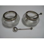 A Pair of Hallmarked Silver Mounted Glass Salts, together with matched pair of associated spoons.