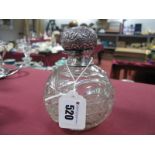 A Hallmarked Silver Topped Cut Glass Globular Scent Bottle, Birmingham 1903.