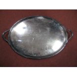 An Electroplated Oval Twin Handled Serving Tray, cast leaf and reeded handles, ribbon tie border,