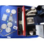 Wristwatches, commemorative coins, scent bottle etc:- One Tray