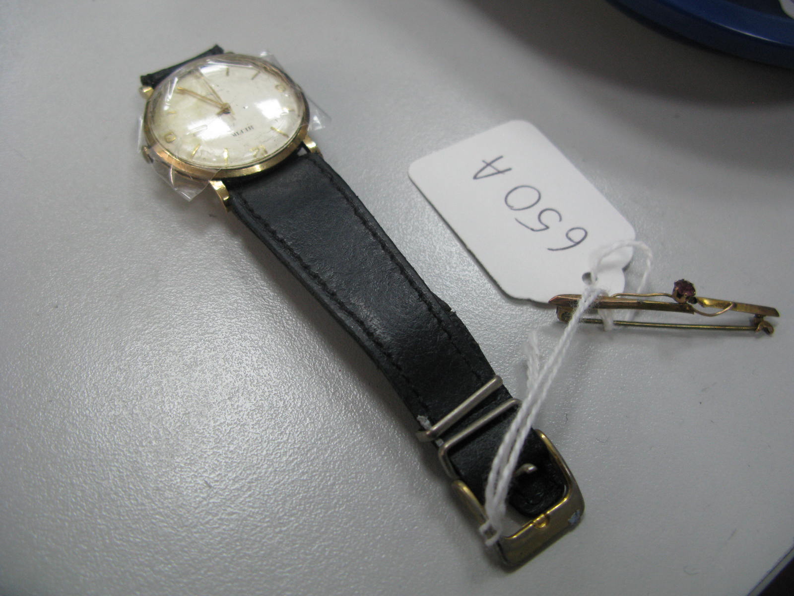 A Vintage Gent's Wristwatch, the Hefik signed dial with Arabic numerals and line markers, within