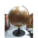 A Large 'Philip's 18inch Terrestrial Globe' - brass frame on wooden stand - (slight repair noted).