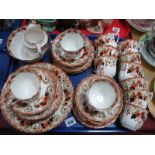 A Circa 1900 Twelve Setting China Tea Service, printed and painted decoration of flowers and foliage