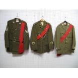 Three British Post War Khaki No. 2 Tunics/Jackets, sometimes with trousers, Sergeants rank noted,