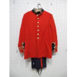 A Post War Military Uniform, comprising of red tunic and navy trousers.