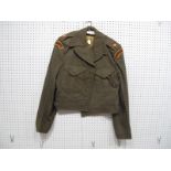 A WWII Period Battle Dress Blouse, Auxiliary Territorial Service, dated 1944.