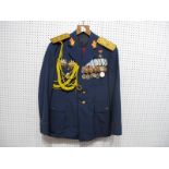 A Romanian Military Uniform Complete with Medals.