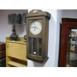 A 1920's Oak Cased Regulator Wall Clock, with eight day movement, black numerals to silvered dial.