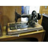 A Late XIX Century Frister & Rossmann Germany, sewing machine in a walnut case.