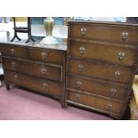 An Oak Two Piece Bedroom Suite, comprising five heights chest of drawers and a three heights