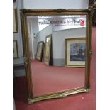 A Rectangular Bevelled Wall Mirror, in gilt frame, approximately 92 x 116cm