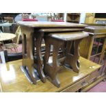 Ercol Nest of Three Coffee Tables, with rounded corners to rectangular tops on openwork supports,