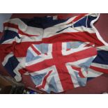 A Large Union Jack, 270 x 120cm, good condition; another smaller version. (2)