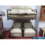 A 1920's Mahogany Three Piece Lounge Suite, with vase central splat to Bergeres back and sides,