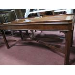 A Mahogany Rectangular Shaped Coffee Table, on chamfered legs, 'C' scroll brackets, with 'X'