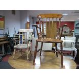 A XIX Century Child's Ash and Elm Country Open Armchair, bar back, turned spindles, shaped seat