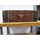 A XIX Century Walnut Brass Bound Writing Slope, with drawers and fitted interior, but no scriver,