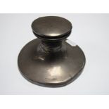 A Hallmarked Silver Capstan Inkwell, (marks rubbed) the hinged lid engraved "H.M.S Worcester