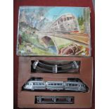 A Mid XX Century Tinplate Electric Train Set by Joustra of France, comprising a three piece
