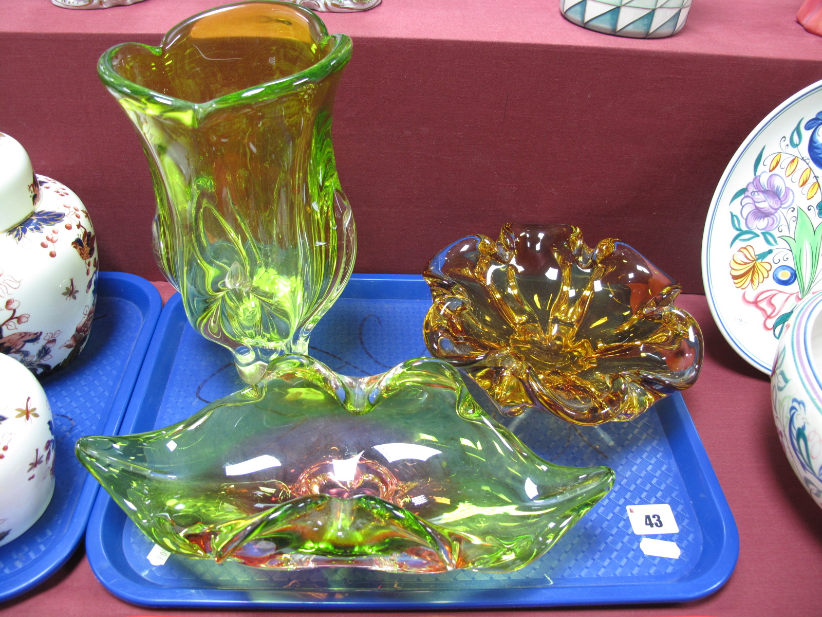 A Green Tinted Murano Type Vase, of quatrefoil form, a similar freeform bowl and an amber tinted