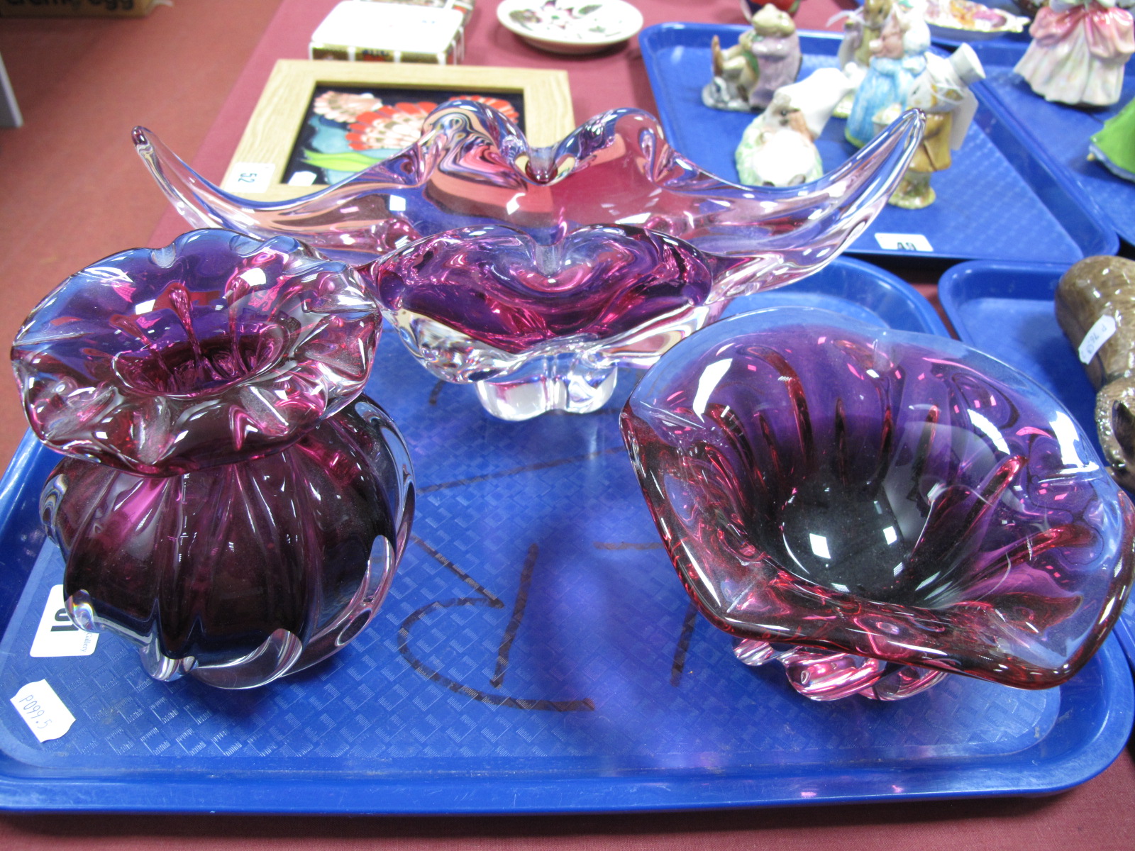 A Murano Type Ruby Tinted Freeform Bowl, a basket and a circular bowl.