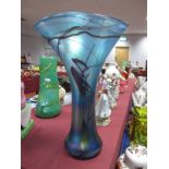 John Ditchfield for Glasform; An Iridescent Blue Vase, with undulating flared upper body, etched