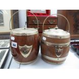 Two Oak Biscuit Barrels, each with electroplated lids, swing handles and blank shield cartouches.