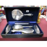 A Silver Backed Five Piece Dressing Table Set, Birmingham 1919 (cased).