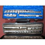 A Hernals Model S100 Three Piece Flute, and a Claremont three piece flute (both cased) (2)