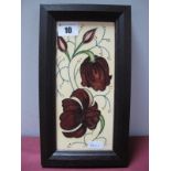 A Moorcroft Pottery Plaque, painted with the 'Chocolate Cosmos' pattern, designed by Rachel